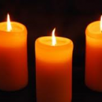 three orange candles